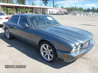 2001 Jaguar XJ with VIN SAJDA15B21MF36977, listed as a IAAI auction lot 42377504 with 115,340 mi miles and . Bid and sale history available at DreamBid. Image 1.