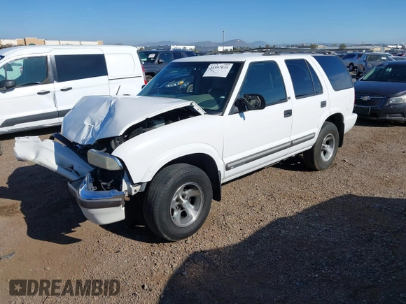 2001 Chevrolet Blazer LT z VIN 1GNCS13W712122865, wystawiony jako IAAI lot #41997035 z przebiegiem 161 862 mil mil oraz . Historia ofert i sprzedaży dostępna na DreamBid. Obrazek 17.