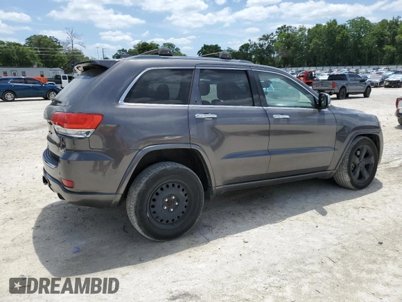 2014 Jeep Grand Cherokee Overland with VIN 1C4RJFCT7EC182234, listed as a Copart auction lot 54754465 with 185,658 mi miles and Salvage Title. Bid and sale history available at DreamBid. Image 3.