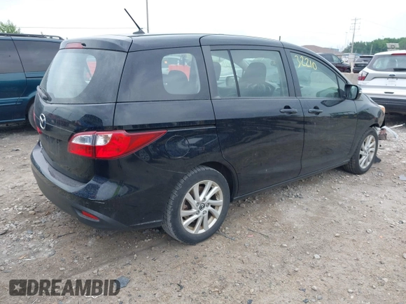 2015 Mazda 5 Sport with VIN JM1CW2BL2F0190990, listed as a IAAI auction lot 42532210 with 98,528 mi miles and . Bid and sale history available at DreamBid. Image 4.