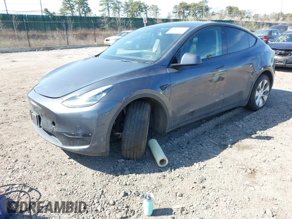 2022 Tesla Model Y Long Range with VIN 7SAYGDEE2NF460945, listed as a IAAI auction lot 41921645 with 62,318 mi miles and . Bid and sale history available at DreamBid. Image 18.