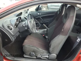 2009 Mitsubishi Eclipse GS with VIN 4A3AK24F89E029994, listed as a Copart auction lot 71643034 with 177,874 mi miles and Salvage Title. Bid and sale history available at DreamBid. Image 7.