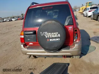 2002 Suzuki Grand Vitara JLX with VIN JS3TD62V824152943, listed as a IAAI auction lot 41668395 with 104,191 mi miles. Bid and sale history available at carsss.com. Image 17.