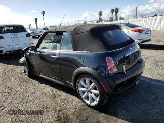 2006 MINI Convertible S with VIN WMWRH33536TK59272, listed as a Copart auction lot 51144475 with 46,024 mi miles and Salvage Title. Bid and sale history available at DreamBid. Image 2.