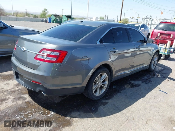 2013 Ford Taurus SEL with VIN 1FAHP2E81DG113242, listed as a IAAI auction lot 41952486 with 169,369 mi miles. Bid and sale history available at carsss.com. Image 4.