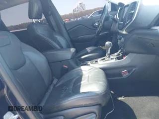 2015 Jeep Cherokee Trailhawk z VIN 1C4PJMBS3FW520829, wystawiony jako IAAI lot #42065548 z przebiegiem 90 534 mil mil oraz . Historia ofert i sprzedaży dostępna na DreamBid. Obrazek 5.