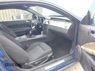 2007 Ford Mustang Deluxe z VIN 1ZVFT80N975270219, wystawiony jako IAAI lot #42364898 z przebiegiem 183 462 mil mil oraz . Historia ofert i sprzedaży dostępna na DreamBid. Obrazek 5.