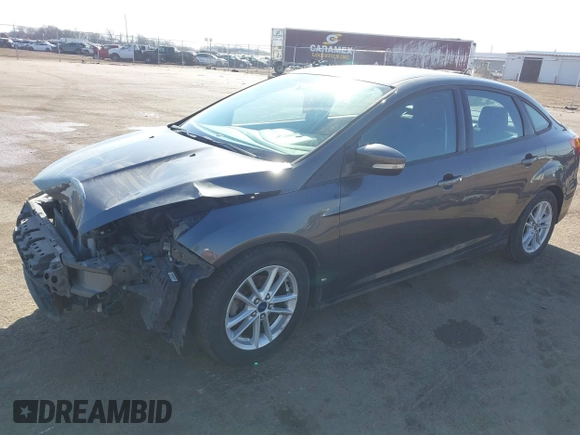 2016 Ford Focus SE with VIN 1FADP3F21GL212718, listed as a IAAI auction lot 41785985 with 101,198 mi miles. Bid and sale history available at carsss.com. Image 2.