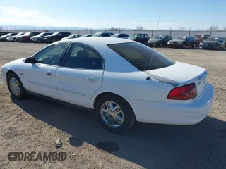 2003 Mercury Sable LS Premium with VIN 1MEHM55S73G630347, listed as a IAAI auction lot 41427588 with 125,285 mi miles. Bid and sale history available at carsss.com. Image 3.