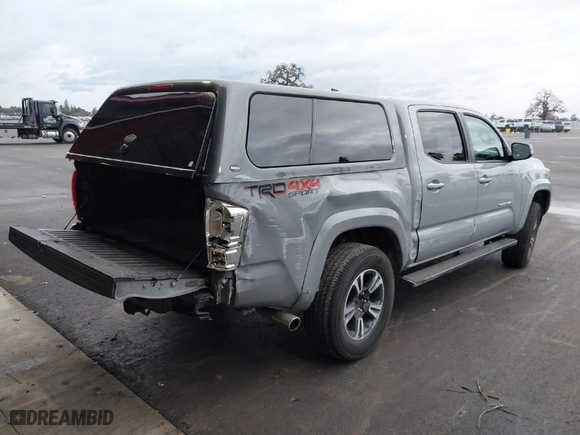 2018 Toyota Tacoma SR with VIN 3TMCZ5AN9JM177736, listed as a IAAI auction lot 41534308 with 250,608 mi miles. Bid and sale history available at carsss.com. Image 4.