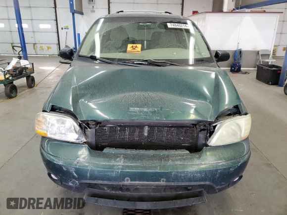 2002 Ford Windstar Sport Standard z VIN 2FMZA57452BB86707, wystawiony jako Copart lot #74840214 z przebiegiem 196 451 mil mil oraz Szkody całkowita. Historia ofert i sprzedaży dostępna na DreamBid. Obrazek 5.