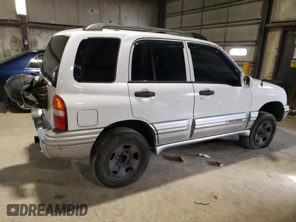 2002 Chevrolet Tracker LT z VIN 2CNBJ634126927635, wystawiony jako Copart lot #78814333 z przebiegiem 224 726 mil mil oraz Szkoda całkowita • Salvage title. Historia ofert i sprzedaży dostępna na DreamBid. Obrazek 3.