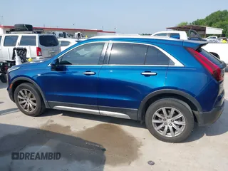 2019 Cadillac XT4 FWD Premium Luxury с VIN 1GYFZCR44KF144295, выставлен на аукционе IAAI как лот 42273524 с пробегом 68 736 миль миль и . История ставок и продаж доступна на DreamBid. Изображение 14.