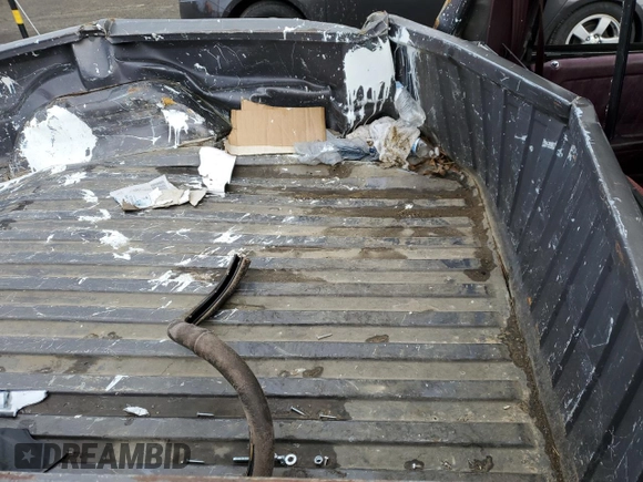 1989 Dodge Dakota S z VIN 1B7GL26X9KS129335, wystawiony jako Copart lot #82744003 z przebiegiem 174 152 mil mil oraz Szkoda całkowita • Salvage title. Historia ofert i sprzedaży dostępna na DreamBid. Obrazek 10.