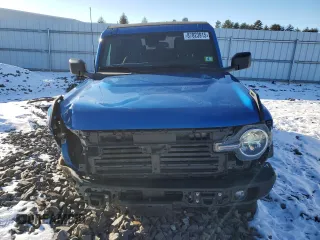 2023 Ford Bronco with VIN 1FMDE5BH0PLB15673, listed as a Copart auction lot 87823915 with 24,749 mi miles and Salvage Title. Bid and sale history available at DreamBid. Image 5.