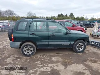2002 Chevrolet Tracker z VIN 2CNBJ13C126946857, wystawiony jako IAAI lot #41491975 z przebiegiem Nie podano mil oraz . Historia ofert i sprzedaży dostępna na DreamBid. Obrazek 14.