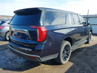 2022 GMC Yukon XL SLT with VIN 1GKS2GKDXNR134694, listed as a IAAI auction lot 41475723 with 52,579 mi miles. Bid and sale history available at carsss.com. Image 4.