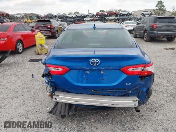 2020 Toyota Camry LE with VIN 4T1L11AK5LU310671, listed as a IAAI auction lot 41732306 with 61,379 mi miles and . Bid and sale history available at carsss.com. Image 17.
