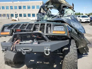 1998 Jeep Cherokee Sport with VIN 1J4FJ68S3WL237566, listed as a Copart auction lot 67380164 with 0 mi miles and Non Repairable. Bid and sale history available at carsss.com. Image 5.