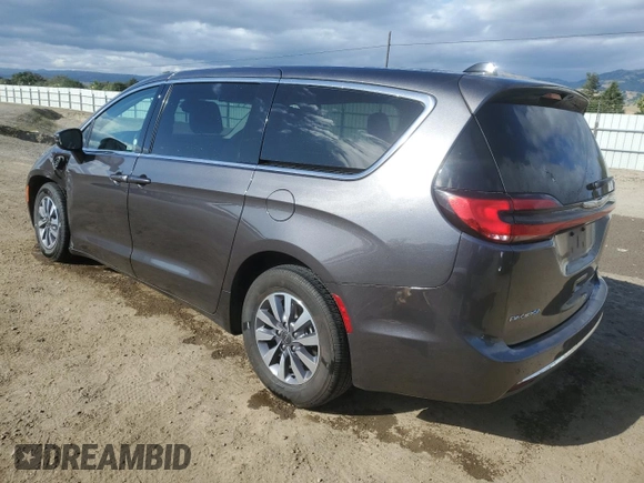 2023 Chrysler Pacifica Hybrid Touring L with VIN 2C4RC1L79PR608659, listed as a Copart auction lot 56945365 with 45,697 mi miles and Salvage title. Bid and sale history available at DreamBid. Image 2.