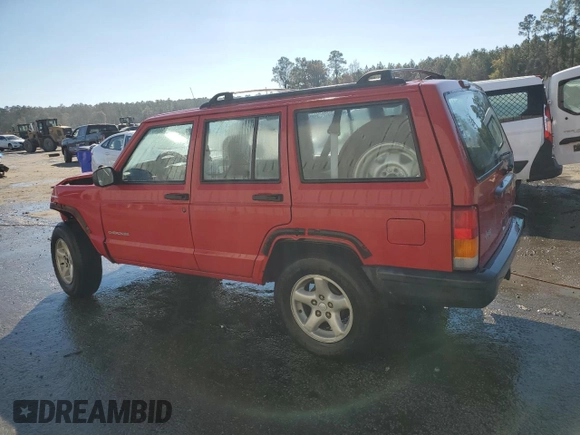 1999 Jeep Cherokee SE with VIN 1J4FT28S6XL515896, listed as a Copart auction lot 83745444 with 192,406 mi miles and Salvage title. Bid and sale history available at DreamBid. Image 2.