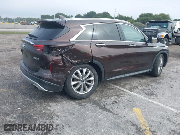 2020 Infiniti QX50 Luxe with VIN 3PCAJ5M10LF119755, listed as a IAAI auction lot 41356089 with 39,243 mi miles and . Bid and sale history available at DreamBid. Image 4.