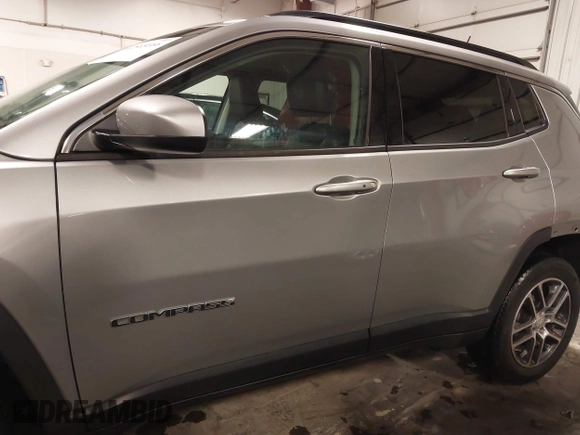 2019 Jeep Compass Latitude with VIN 3C4NJDBB6KT812711, listed as a IAAI auction lot 41565166 with 69,582 mi miles and . Bid and sale history available at carsss.com. Image 15.