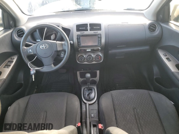 2014 Scion xD with VIN JTKKUPB49E1040402, listed as a Copart auction lot 64997275 with 242,266 mi miles and Clean title. Bid and sale history available at DreamBid. Image 8.