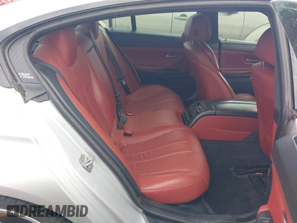 2014 BMW 6 Series 650i z VIN WBA6B2C58ED129639, wystawiony jako IAAI lot #42171786 z przebiegiem 108 677 mil mil oraz . Historia ofert i sprzedaży dostępna na DreamBid. Obrazek 8.