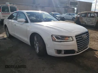 2015 Audi A8 4.0T with VIN WAUJ2AFD3FN005524, listed as a Copart auction lot 65610982 with 105,627 mi miles and . Bid and sale history available at DreamBid. Image 1.