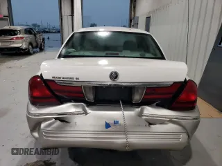 2005 Mercury Grand Marquis GS z VIN 2MEFM74W05X612471, wystawiony jako Copart lot #49455195 z przebiegiem 140 916 mil mil oraz Szkoda całkowita • Salvage title. Historia ofert i sprzedaży dostępna na DreamBid. Obrazek 6.