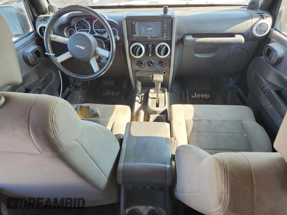 2008 Jeep Wrangler Unlimited Sahara with VIN 1J8GA59158L538460, listed as a Copart auction lot 63897295 with 335,852 mi miles and Clean title. Bid and sale history available at DreamBid. Image 8.