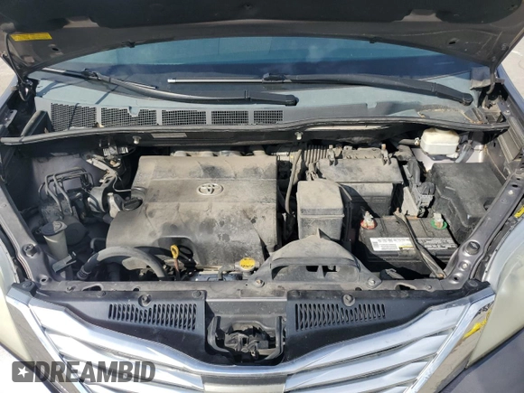 2011 Toyota Sienna XLE AAS with VIN 5TDYK3DC5BS010512, listed as a Copart auction lot 58614775 with 215,020 mi miles and Clean title. Bid and sale history available at DreamBid. Image 12.
