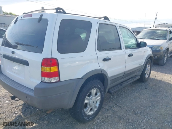 2001 Ford Escape XLT with VIN 1FMYU04151KF69759, listed as a IAAI auction lot 41997906 with 182,133 mi miles. Bid and sale history available at carsss.com. Image 4.