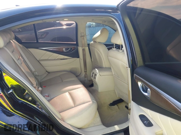 2014 Infiniti Q50 Premium with VIN JN1BV7AP0EM687787, listed as a IAAI auction lot 42084288 with 109,499 mi miles and . Bid and sale history available at carsss.com. Image 8.