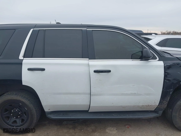 2018 Chevrolet Tahoe Commercial with VIN 1GNLCDEC1JR312458, listed as a IAAI auction lot 41371563 with 114,086 mi miles. Bid and sale history available at carsss.com. Image 13.