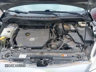 2012 Mazda 5 Sport with VIN JM1CW2BL0C0111151, listed as a IAAI auction lot 42359887 with 158,986 mi miles and . Bid and sale history available at DreamBid. Image 10.