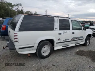 1995 GMC Suburban z VIN 1GKFK16K3SJ704911, wystawiony jako Copart lot #88326825 z przebiegiem 191 006 mil mil oraz Szkoda całkowita • Salvage title. Historia ofert i sprzedaży dostępna na DreamBid. Obrazek 3.