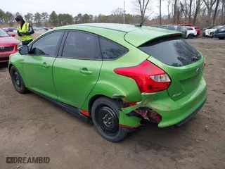 2012 Ford Focus SE with VIN 1FAHP3K26CL125074, listed as a IAAI auction lot 41790997 with 156,993 mi miles. Bid and sale history available at carsss.com. Image 3.
