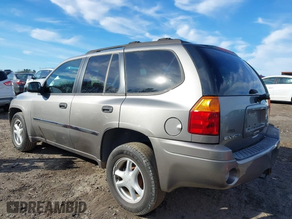 2007 GMC Envoy SLE with VIN 1GKDS13S372241844, listed as a IAAI auction lot 41575443 with 144,726 mi miles. Bid and sale history available at carsss.com. Image 3.