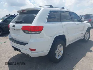 2015 Jeep Grand Cherokee Altitude with VIN 1C4RJEAG3FC722499, listed as a IAAI auction lot 41894727 with 105,616 mi miles. Bid and sale history available at carsss.com. Image 4.