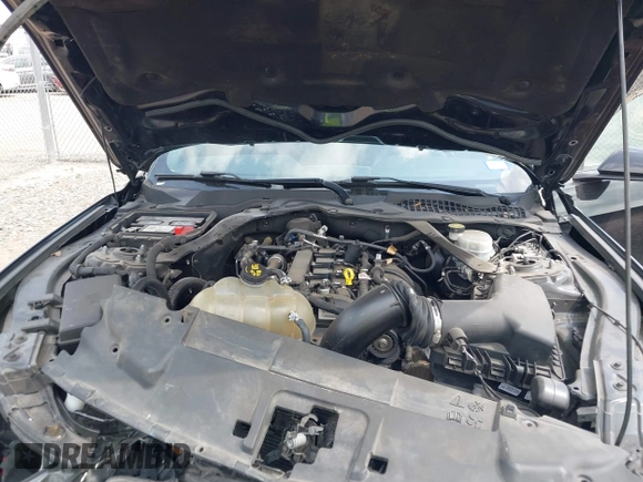 2021 Ford Mustang EcoBoost z VIN 1FATP8UH2M5120226, wystawiony jako IAAI lot #42164009 z przebiegiem 85 571 mil mil oraz . Historia ofert i sprzedaży dostępna na DreamBid. Obrazek 10.