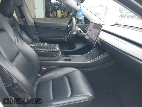 2021 Tesla Model Y Standard Range with VIN 5YJYGDED8MF114076, listed as a IAAI auction lot 41567295 with 150,133 mi miles and . Bid and sale history available at DreamBid. Image 5.