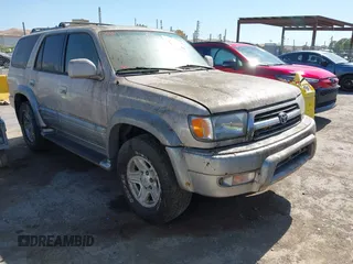 2000 Toyota 4Runner Limited z VIN JT3HN87R0Y9036323, wystawiony jako IAAI lot #42369188 z przebiegiem 283 128 mil mil oraz . Historia ofert i sprzedaży dostępna na DreamBid. Obrazek 1.