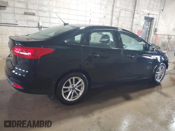2016 Ford Focus SE with VIN 1FADP3F29GL371728, listed as a Copart auction lot 48871195 with 87,079 mi miles and Salvage Title. Bid and sale history available at carsss.com. Image 3.