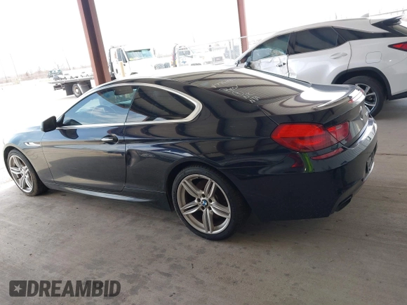 2012 BMW 6 Series 650i z VIN WBALX3C51CDV77602, wystawiony jako IAAI lot #41668235 z przebiegiem 103 684 mil mil oraz . Historia ofert i sprzedaży dostępna na DreamBid. Obrazek 14.