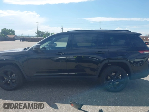 2023 Jeep Grand Cherokee Altitude with VIN 1C4RJJAG4P8817795, listed as a IAAI auction lot 42572709 with 49,468 mi miles and . Bid and sale history available at DreamBid. Image 15.