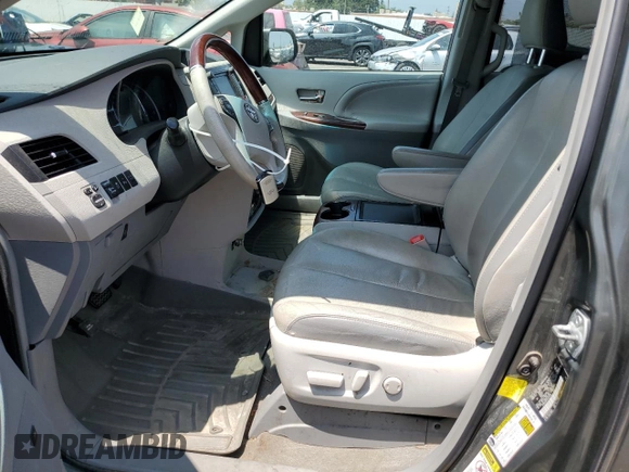 2012 Toyota Sienna XLE with VIN 5TDDK3DC1CS043460, listed as a Copart auction lot 64900495 with 190,187 mi miles and Clean title. Bid and sale history available at DreamBid. Image 7.
