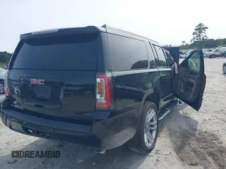 2019 GMC Yukon XL SLT with VIN 1GKS2GKCXKR359166, listed as a IAAI auction lot 40546837 with Not provided miles and . Bid and sale history available at DreamBid. Image 4.