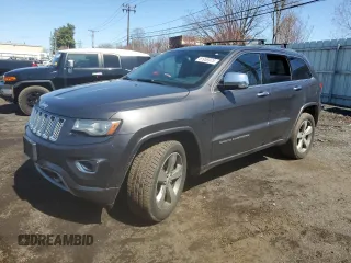 2014 Jeep Grand Cherokee Overland with VIN 1C4RJFCT2EC239438, listed as a Copart auction lot 51955975 with 165,440 mi miles and Salvage Title. Bid and sale history available at carsss.com. Image 1.